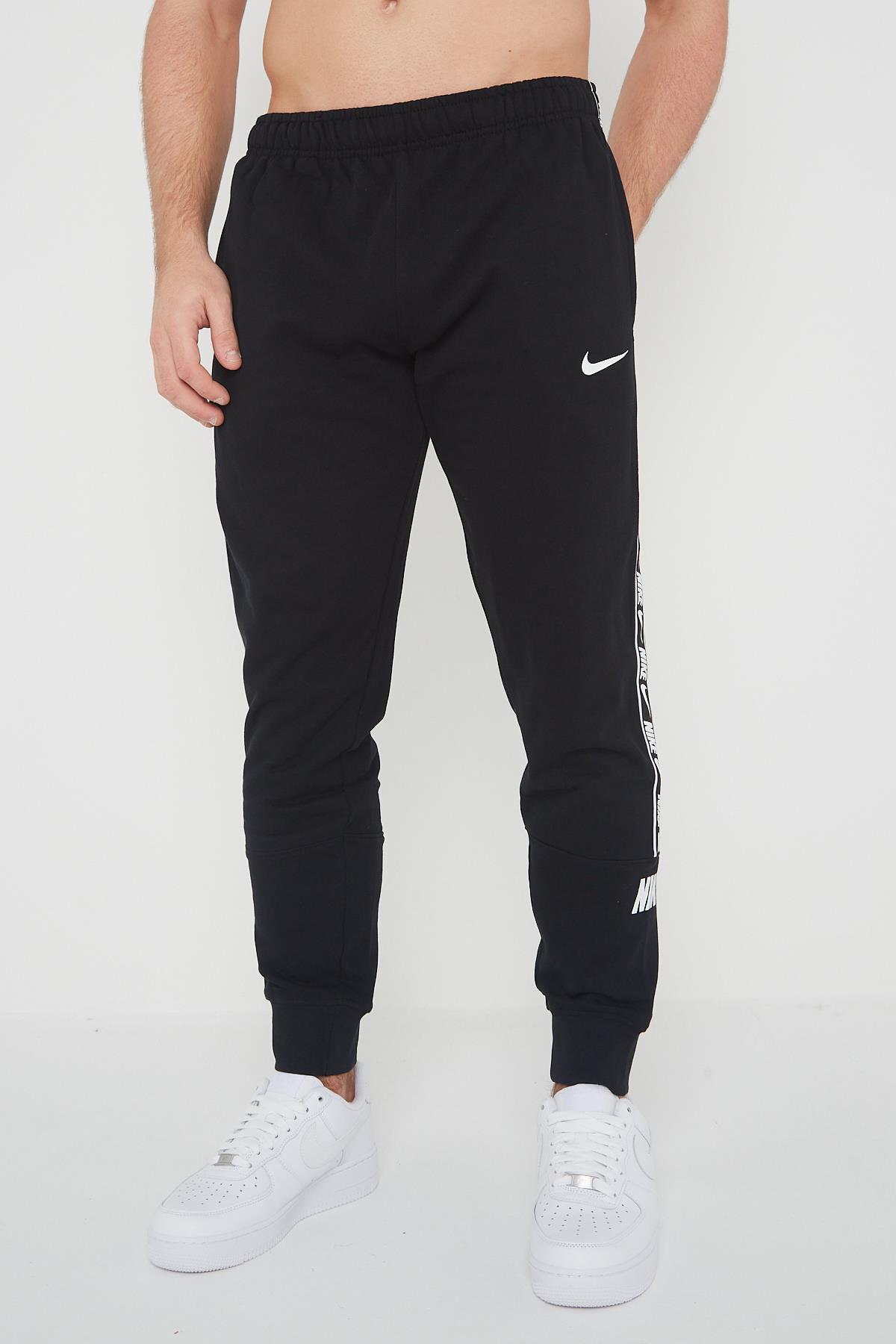 Nike Mens Repeat Taping Logo Fleece Cuffed Joggers in Black Cotton - Size Medium