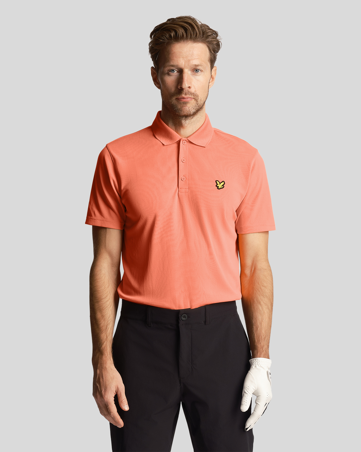 Thumbnail - Polo technique de golf Lyle & Scott en corail