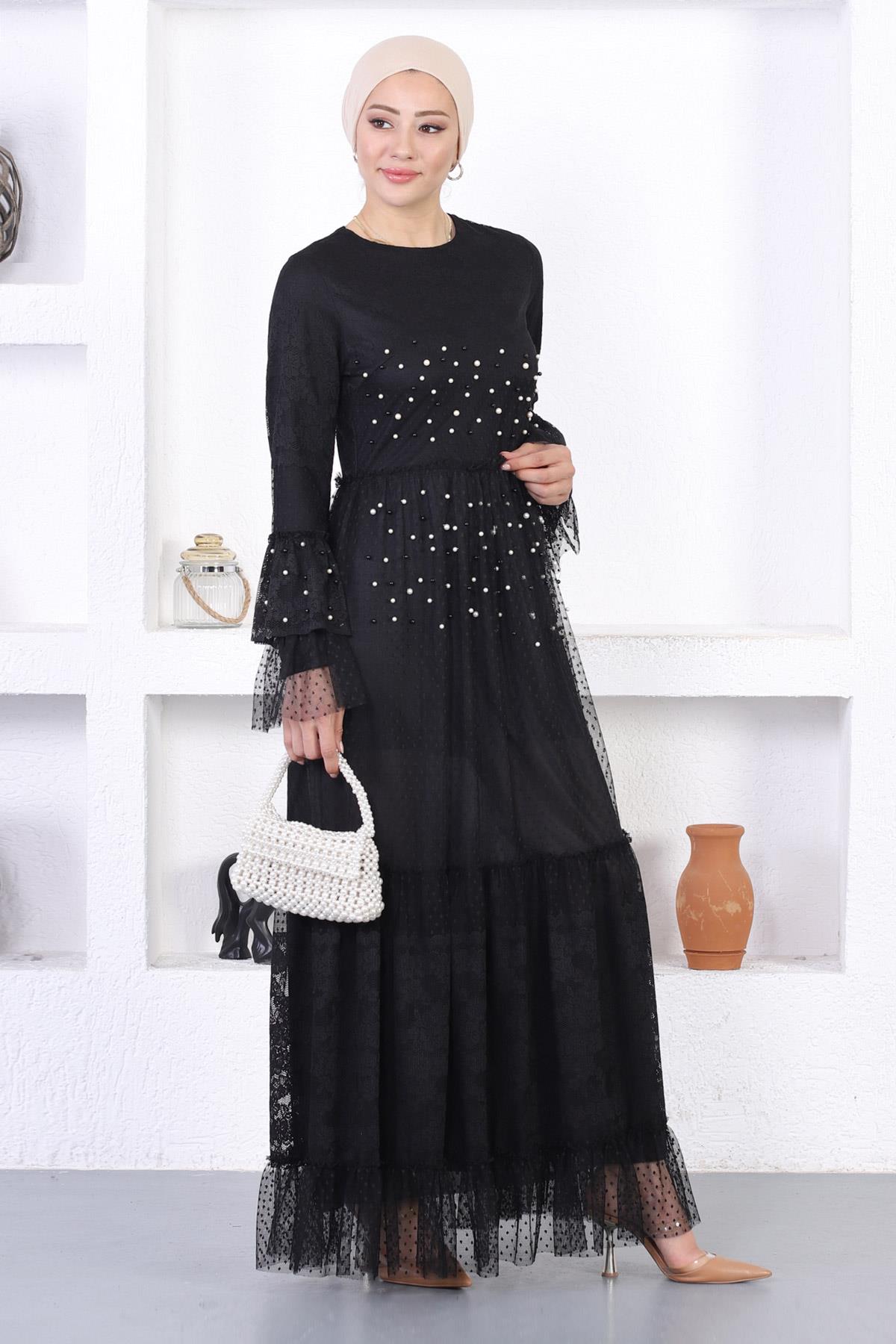 Thumbnail - Abendkleid mit Perlen und Rüschenärmeln