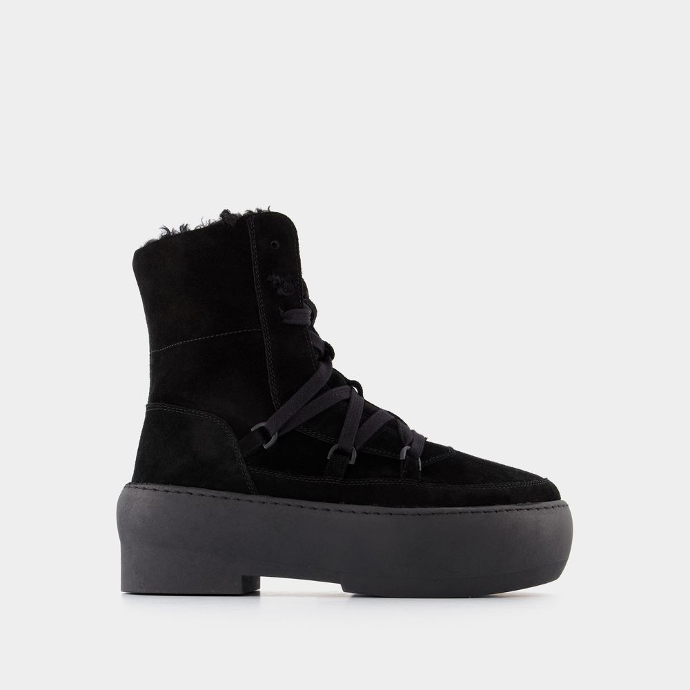 Chunky Sole snörkängor i svart läder