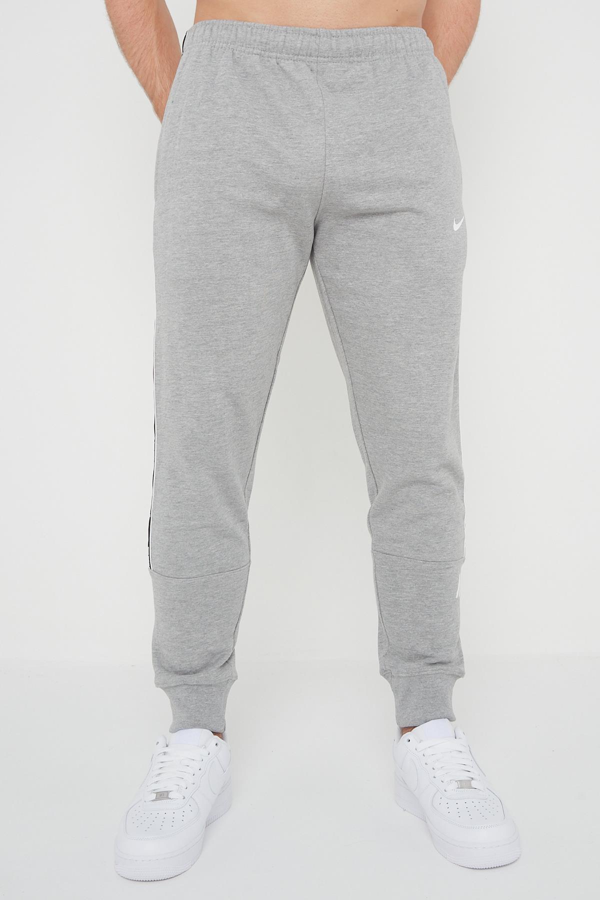 Nike Mens Repeat Taping Logo Fleece Cuffed Joggers in Grey Cotton - Size Large
