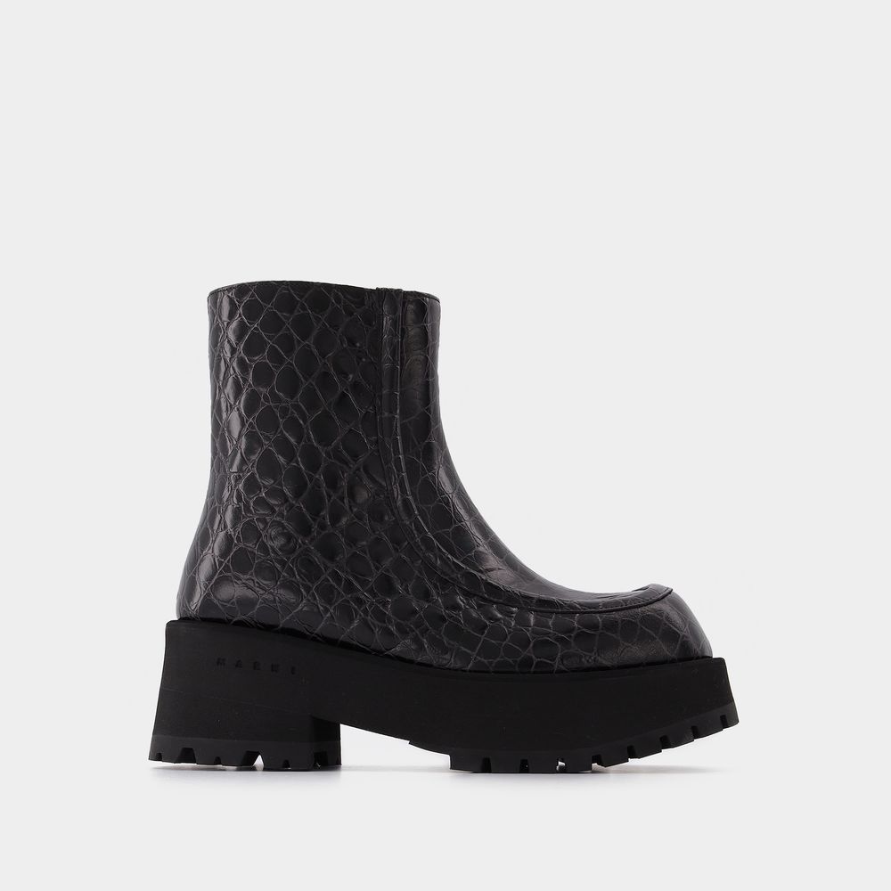 Booties med dragkedja i svart läder