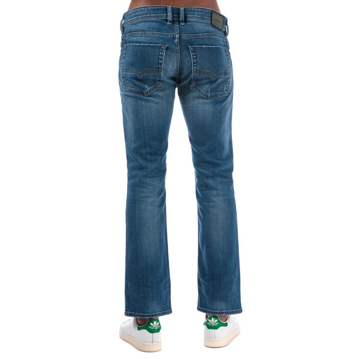 Mens Diesel Zatiny Bootcut Jeans in Light Blue Denim<BR><BR>- Button fly.<BR>- Five pocket styling.<BR>- Belt loops to the waist.<BR>- Faded effects to the thighs.<BR>- Distressed effects throughout.<BR>- Regular fit.<BR>- Bootcut leg.<BR>- Branding details to pocket and leather rear tab.<BR>-<BR>- Short inside leg length approx. 30in  Regular inside leg length approx. 32in. Long inside leg length approx. 34in.<BR>- 97% Cotton  2% Elastmultiester  1% Elastane. Machine washable at 30 degrees.<BR>- Ref: 00ADS3084QQ01<BR><BR>Measurements are intended for guidance only