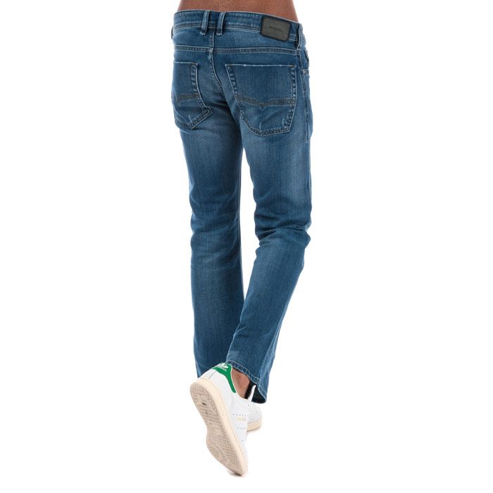 Mens Diesel Zatiny Bootcut Jeans in Light Blue Denim<BR><BR>- Button fly.<BR>- Five pocket styling.<BR>- Belt loops to the waist.<BR>- Faded effects to the thighs.<BR>- Distressed effects throughout.<BR>- Regular fit.<BR>- Bootcut leg.<BR>- Branding details to pocket and leather rear tab.<BR>-<BR>- Short inside leg length approx. 30in  Regular inside leg length approx. 32in. Long inside leg length approx. 34in.<BR>- 97% Cotton  2% Elastmultiester  1% Elastane. Machine washable at 30 degrees.<BR>- Ref: 00ADS3084QQ01<BR><BR>Measurements are intended for guidance only