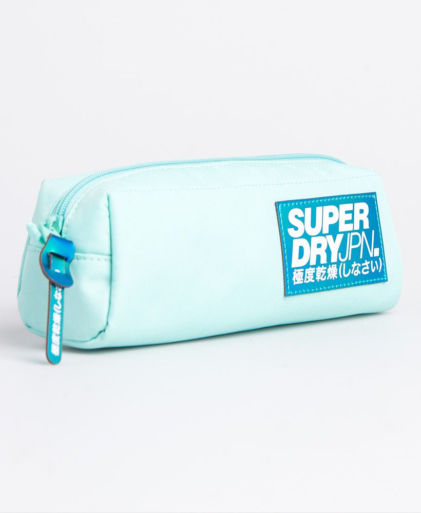 Superdry women's Pearl pencil case. This stylish pencil case is ideal for keeping your stationery essentials together. Featuring a full-length zip fastening, the Pearl pencil case is finished with a Superdry logo patch on the side.L 23cm x H 8cm x D 8cm