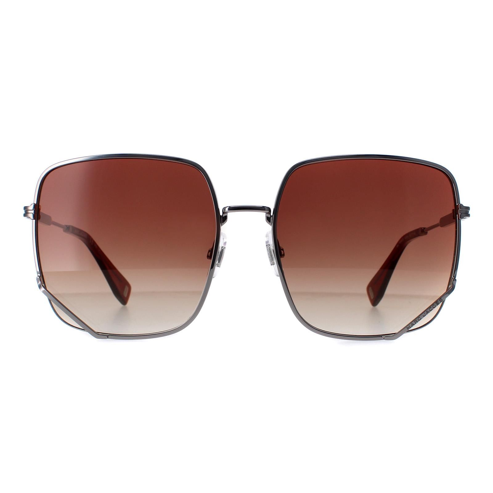 Marc Jacobs Square Womens Ruthenium Grey Brown Gradient MJ 1008/S  Sunglasses feature a lightweight and durable metal square frame that provides a comfortable and secure fit.  Adjustable nose pads and plastic temple tips provide a comfortable and customized fit.  The temples are adorned with the iconic Marc Jacobs logo, adding a touch of elegance and sophistication to the overall look.