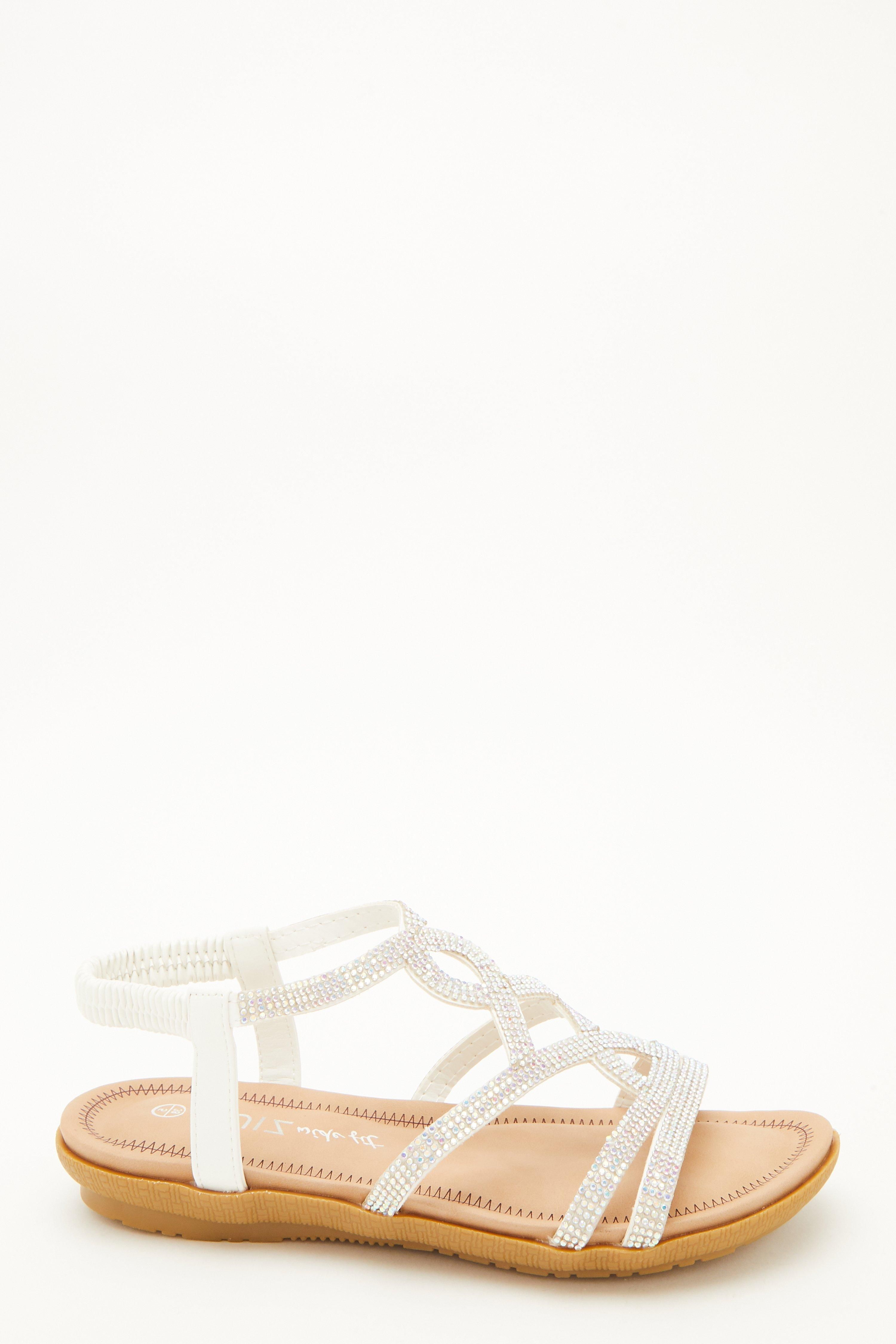 - Wide fit   - Flat sandals  - Diamante detail   - Twist strap desgin   - Elasticated strap  - Padded insole for added comfort