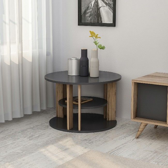 This stylish and functional coffee table is the perfect solution for furnishing the living area and keeping magazines and small items tidy. Easy-to-clean, easy-to-assemble kit included. Color: Walnut, Anthracite | Product Dimensions: W68xD68xH44 cm | Material: Melamine Chipboard | Product Weight: 10,7 Kg | Supported Weight: 10 Kg | Packaging Weight: W73,5xD73,5xH5,7 cm Kg | Number of Boxes: 1 | Packaging Dimensions: W73,5xD73,5xH5,7 cm.