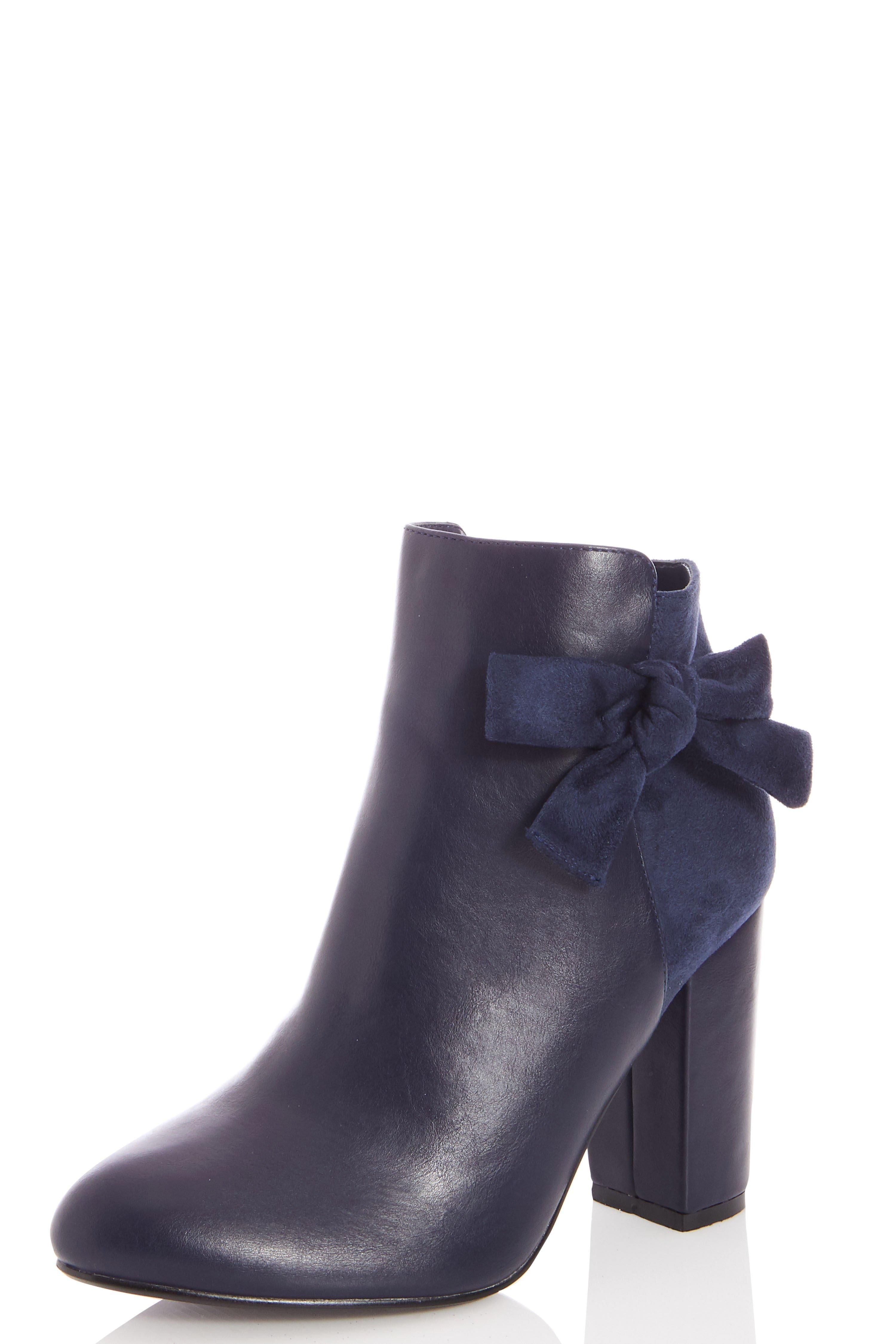 - Bow feature  - Leather look  - Faux suede  - Block heel  - Inner zip fasten  - Heel height: 4