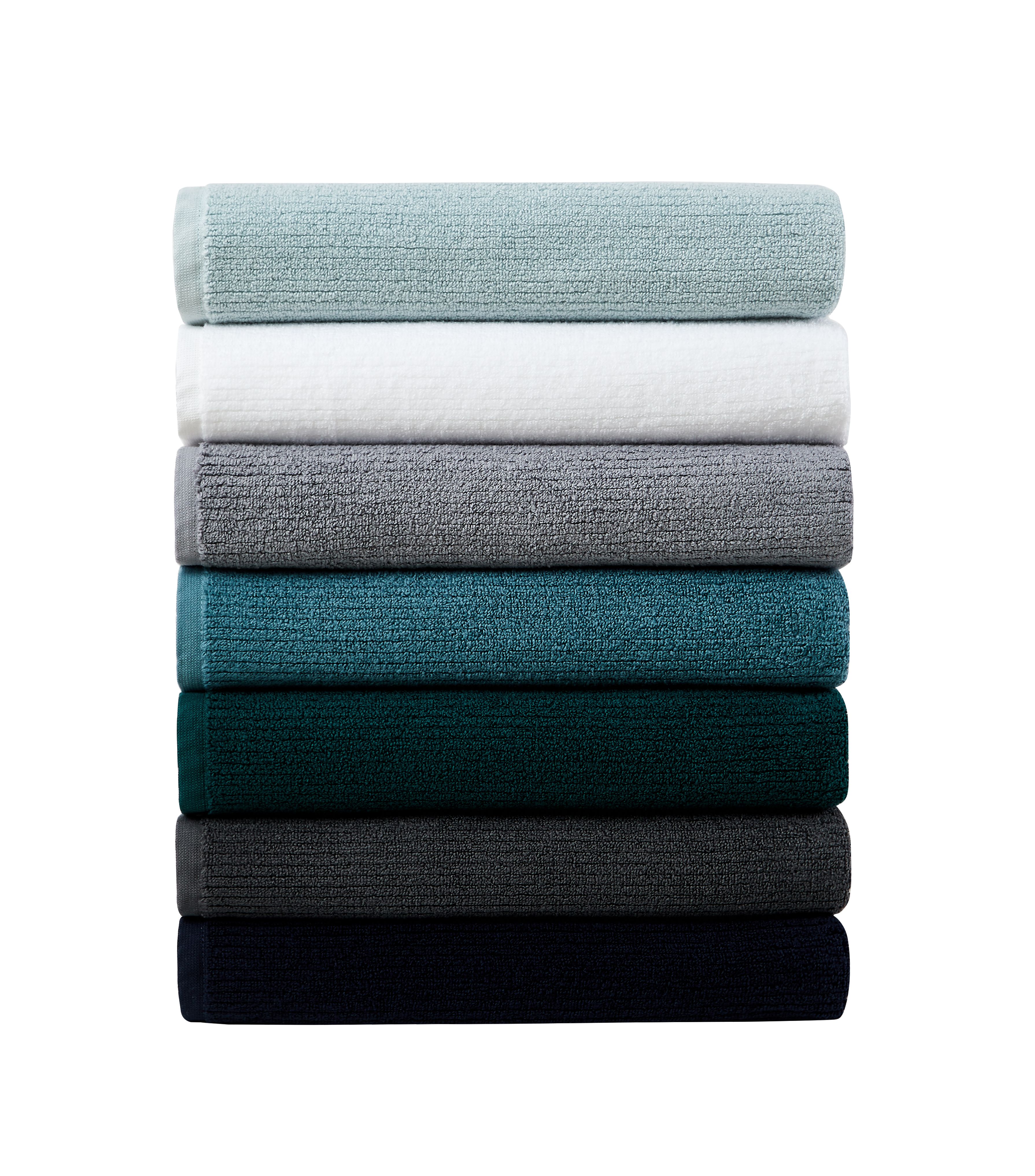 Ultra-soft ribbed terry towels for quick-dry comfort. Finished with a locker loop and printed logo detailing on reverse. Available in White, Pebble, Midnight, Charcoal, Sky, Juniper and Petrol Blue.