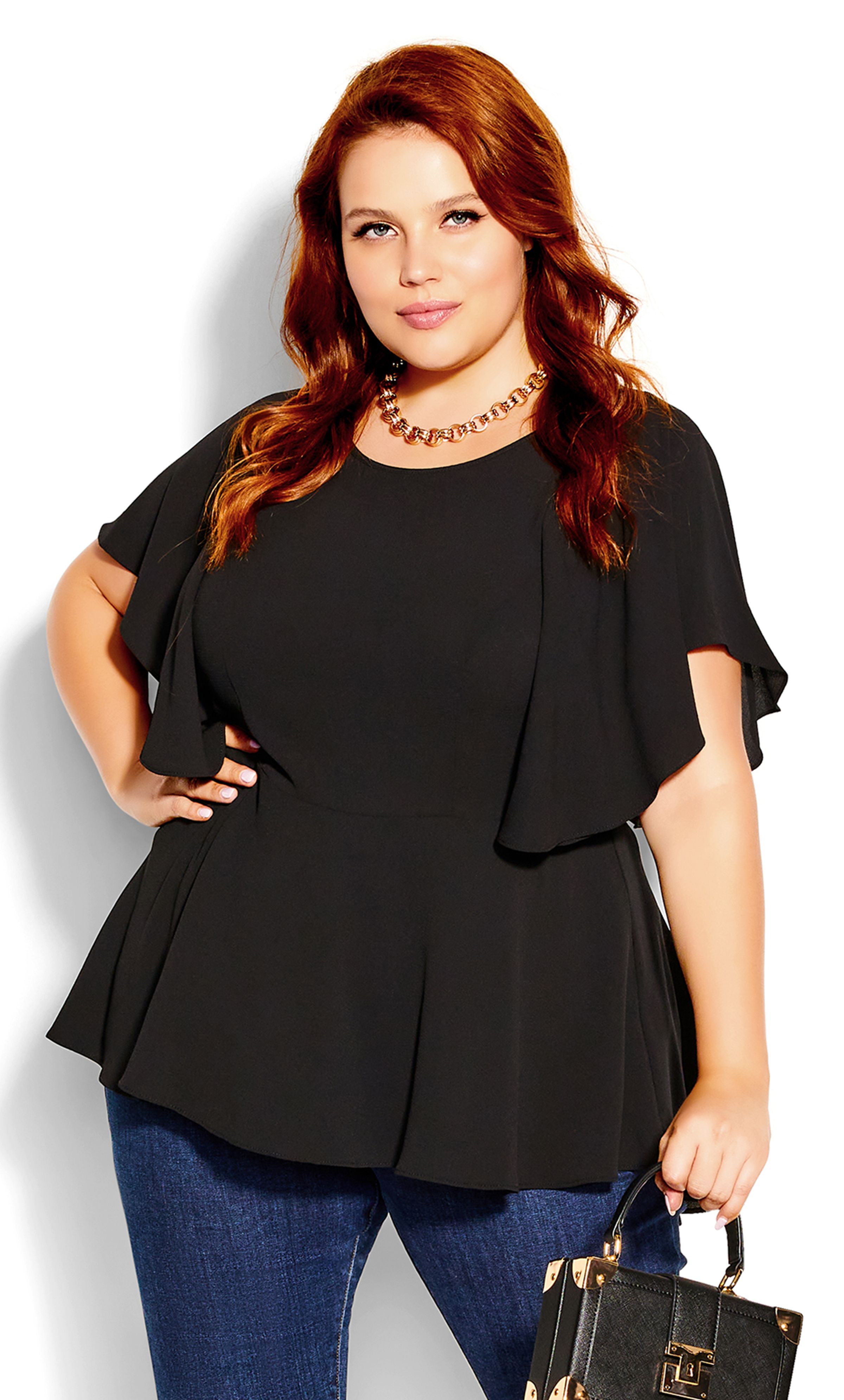 Set the mood in the feminine stylings of our Romantic Mood Top. Offering a flattering flared silhouette and floaty flutter sleeves, this top adds a touch of flirtation to any outfit! Key Features Include: - Round neckline - Floaty open short sleeve - Fitted waist - Peplum shape - Hi-lo hemline - Low V back - Lightweight woven fabrication - Unlined For elevated work wear, style this top with tailored trousers and pumps. Spice it up for the evening with leather look trousers and minimalist heels.