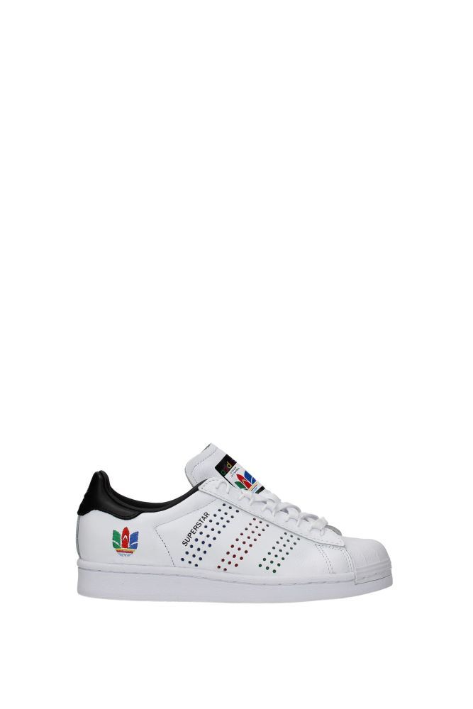 The product with code DSUPERSTARFW5388 leather is a women's sneakers in white/black designed by Adidas. It has features like side detail, aged effect, front logo, back logo. Wear it for these occasions: aperitif with friends, pic nic, in the mountains, travel. Ideal for your style sporty glam, street, casual. The product is made by the following materials: leather, polyurethaneHell height type: low and flatBottomed Shoes is rubberLace up closureRound toe