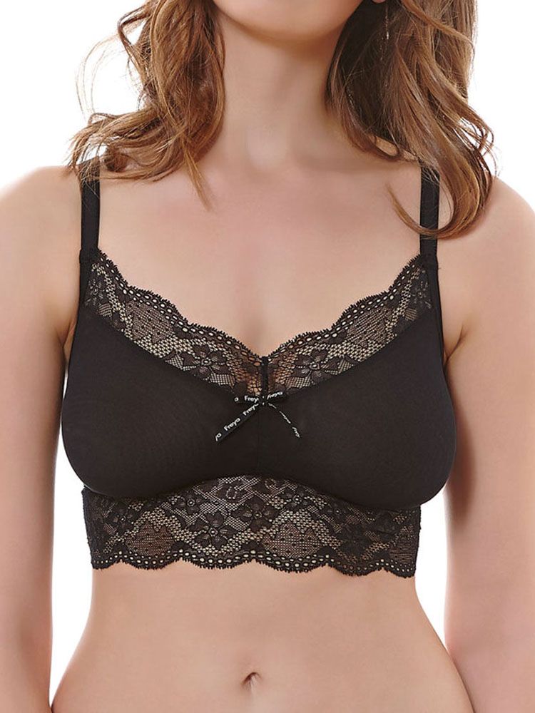 Freya Fancies, a charming and stylish mix-and-match range which features intricate sheer stretch lace for a romantically chic look. This soft cup non-wired lingerie top features slight gathers in the centre for a flattering fit. This lace lingerie features detailing on the neckline and longline feature, for a stylish anf feminine touch. There is no hook and eye fastening at the back - creating a smooth finish underneath clothing. This comfortable bra has adjustable straps and an oversized satin bow in the centre.