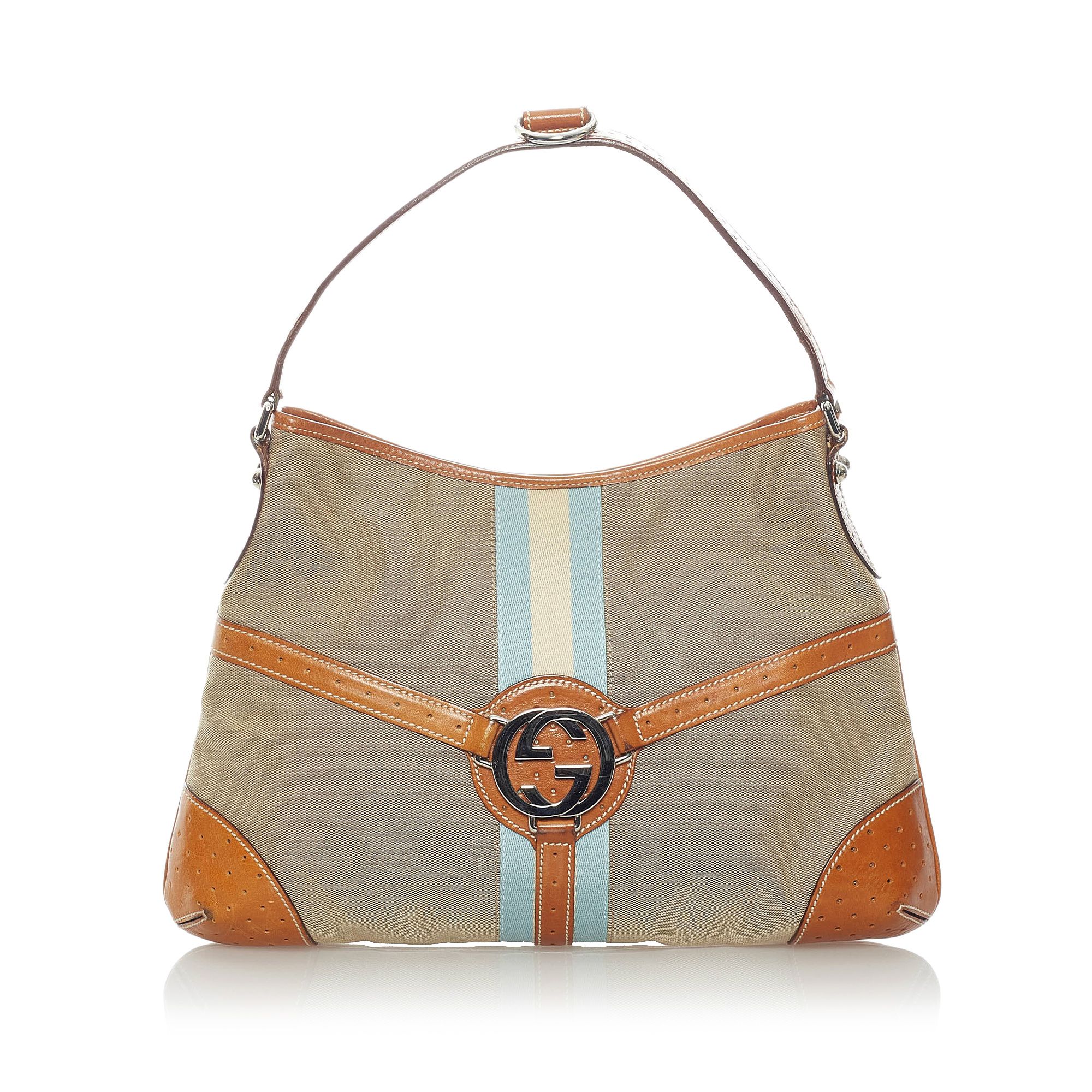 VINTAGE. RRP AS NEW. The Reins hobo features a canvas body, a front exterior leather trim with double G logo, a flat leather handle, a top zip closure, and an interior zip pocket.Exterior back is discolored, out of shape and scratched. Exterior bottom is discolored, out of shape and scratched. Exterior front is discolored, out of shape, scratched and stained with others. Exterior handle is discolored, out of shape, scratched and stained with others. Exterior side is discolored, out of shape and scratched. Buckle is scratched. Lock is scratched. Studs is scratched.

Dimensions:
Length 24cm
Width 35cm
Depth 2cm
Shoulder Drop 15cm

Original Accessories: Dust Bag

Serial Number: 114879
Color: Brown x Light Brown x Multi
Material: Fabric x Canvas x Leather x Calf
Country of Origin: Italy
Boutique Reference: SSU164765K1342


Product Rating: FairCondition

Certificate of Authenticity is available upon request with no extra fee required. Please contact our customer service team.