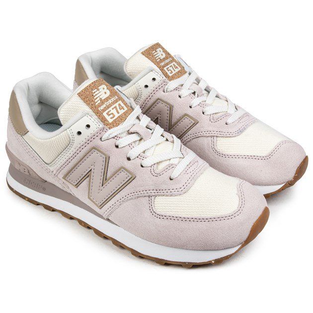 Women's Dusky Pink New Balance 574 Lace-up Trainers With Oversized Iconic N Logo And Suede Panel Detailing Over A Nylon Mesh Upper And Branding In Tan To Heel Pad And Tongue. These Ladies' Running Style Sneakers Have Reinforced Ankle Support, Padded Collar And Tongue For Comfort, And Colour Block Rubber Sole With Tan Multi-grip Tread For Stability And Grip.