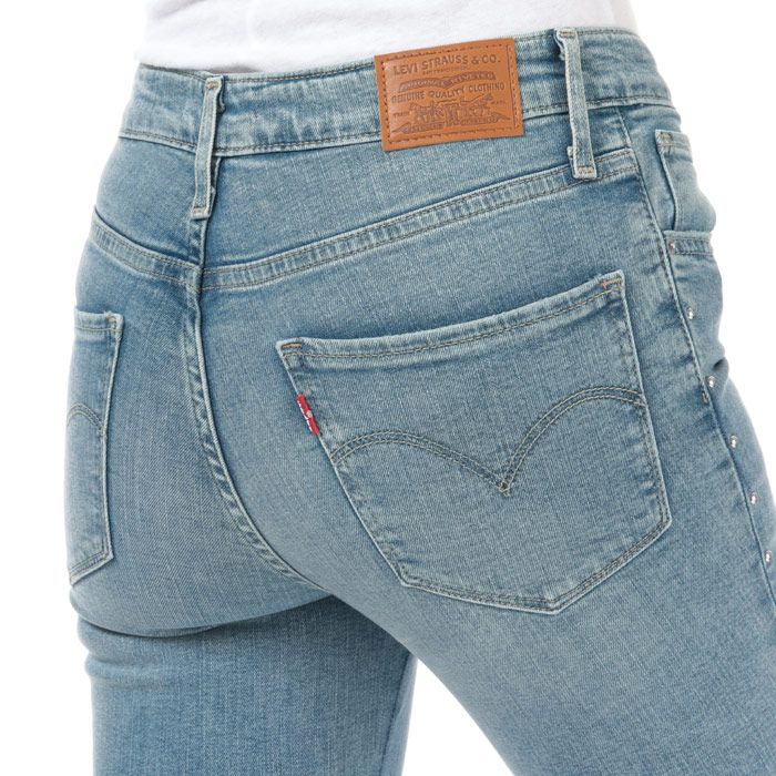 Levi's Women's 721 High Rise Skinny Ankle Jeans in denim.<br><br>- Levi's branded waist patch.<br>- High Rise<br>- Slim through hip and thigh.<br>- Skinny fit.<br>- Iconic Levi's tab to the rear pocket.<br>- Stud detailing to the seams.<br>- Zip and button fastening.<br>- Three front pockets.<br>- Two rear pockets.<br>- Main: 94% cotton  4% polyester  2% elastane. Machine washable.<br>- 228500056
