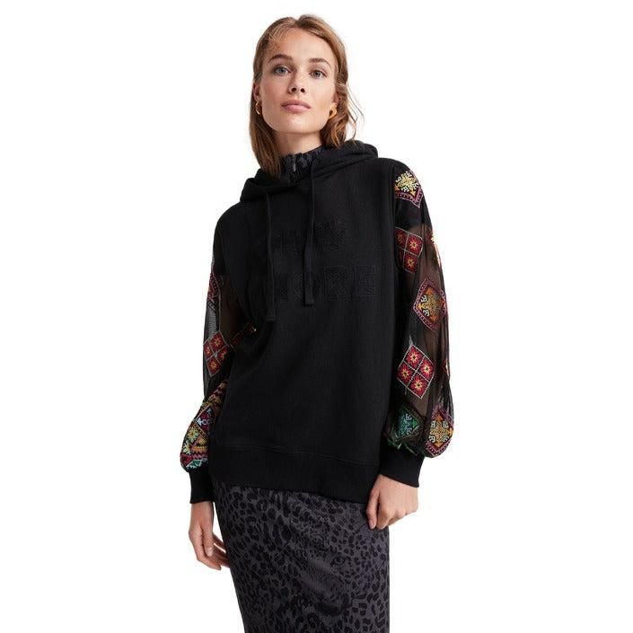 Brand: Desigual
Gender: Women
Type: Sweatshirts
Season: Spring/Summer

PRODUCT DETAIL
• Color: black
• Pattern: print
• Fastening: slip on
• Sleeves: long
• Collar: hood

COMPOSITION AND MATERIAL
• Composition: -77% cotton -1% elastane -22% polyester 
•  Washing: machine wash at 30°