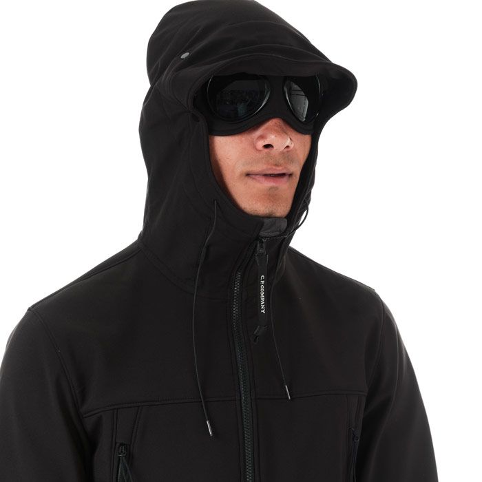 Mens C.P. Company Outerwear Medium Soft Shell Jacket  Black. <BR><BR>- Stretch construction.<BR>- Long sleeves & cuffed hems.<BR>- High neckline.<BR>- Two front side zipped pocket.<BR>- Internal chest pocket. <BR>- Elasticated half rib cuffs.<BR>- Fleeced lining.<BR>- Drawcord adjustable hem.<BR>- Central branded zip down closure. <BR>- Fleeced hood with goggle accents embedded. <BR>- Regular fit.<BR>- External fabric; 94% polyester  6% elastane. Lining; 100% polyamide. Machine washable.<BR>- Ref: 09CMOW041A999.