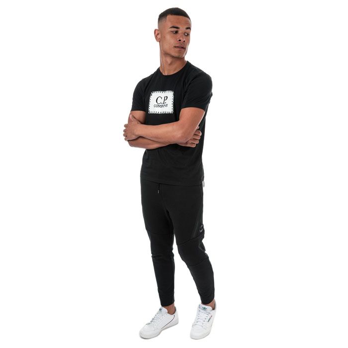 Mens C.P. Company Diagonal Fleece Jog Pants  Black. <BR><BR>- Constructed from a soft cotton.<BR>- Relaxed and comfortable fit. <BR>- Tapered ankle. <BR>- Elasticated waistband for a precise fit. <BR>- Symmetrical side pockets & large zip pockets. <BR>- Iconic Lens detailing for brand recognition on right front leg.<BR>- 100% cotton. Machine washable.<BR>- Ref: 09CMSP029A999