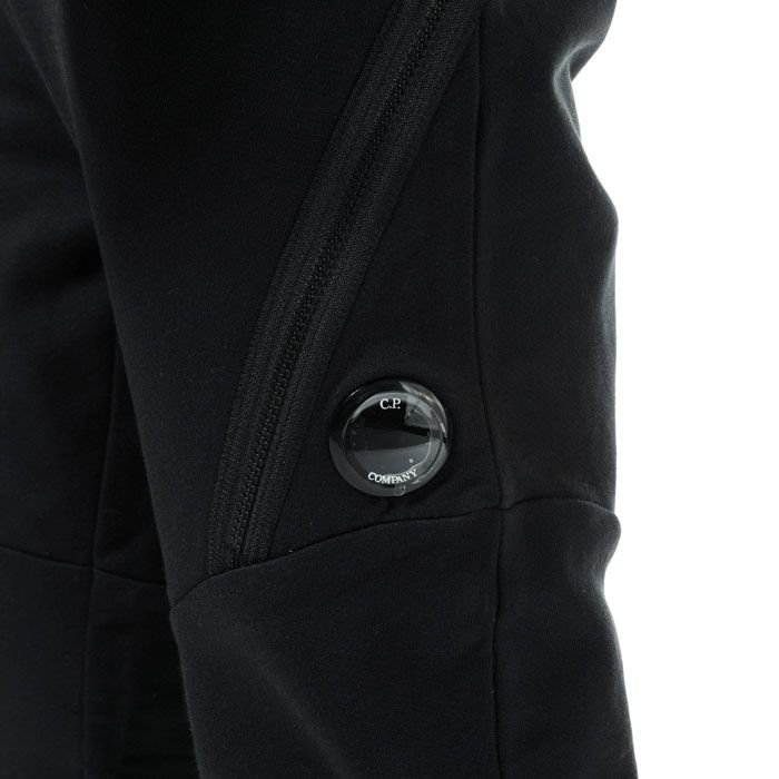 Mens C.P. Company Diagonal Fleece Jog Pants  Black. <BR><BR>- Constructed from a soft cotton.<BR>- Relaxed and comfortable fit. <BR>- Tapered ankle. <BR>- Elasticated waistband for a precise fit. <BR>- Symmetrical side pockets & large zip pockets. <BR>- Iconic Lens detailing for brand recognition on right front leg.<BR>- 100% cotton. Machine washable.<BR>- Ref: 09CMSP029A999