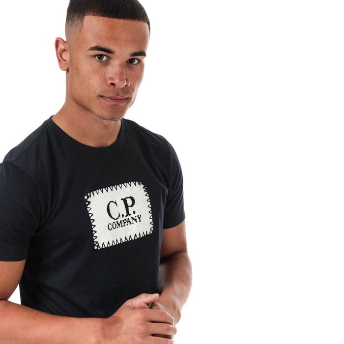 Mens C.P. Company Box Logo T-Shirt  Navy. <BR><BR>- Short sleeves.<BR>- Crew neckline.<BR>- Completed with brands signature block logo adorned to the chest. <BR>- Regular fit.<BR>- 100% cotton. Machine washable.<BR>- Ref: 09CMTS023A888.