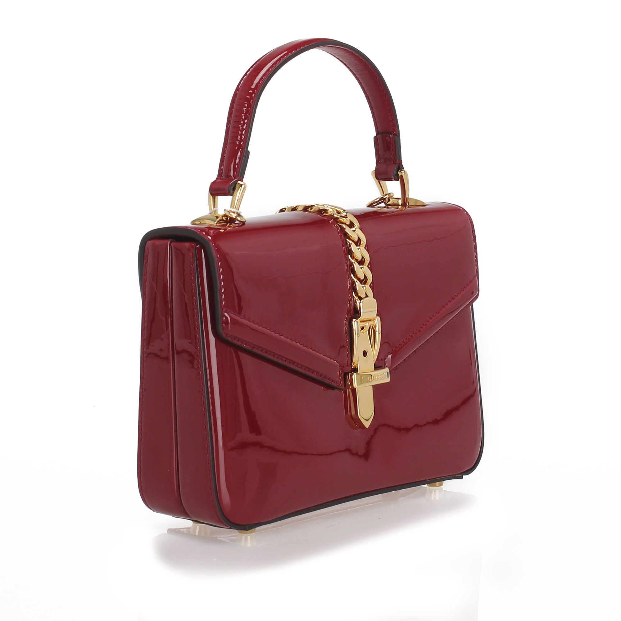 VINTAGE. RRP AS NEW. The Sylvie 1969 features a patent leather body, a gold-tone chain strap, a front flap with magnetic snap closure, and an interior slip pockets.Handle is slightly wrinkled.

Dimensions:
Length 15cm
Width 18cm
Depth 6cm
Hand Drop 10cm
Shoulder Drop 50cm

Original Accessories: Dust Bag, Box, Authenticity Card

Color: Red
Material: Leather x Patent Leather
Country of Origin: Italy
Boutique Reference: SSU79927K1342


Product Rating: VeryGoodCondition