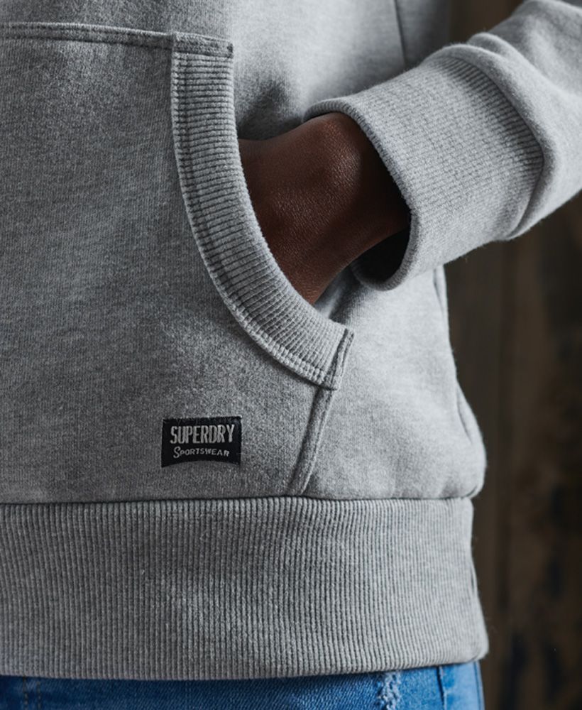 Update your hoodie collection this season with the Limited Edition Graphic Standard hoodie, featuring a Superdry logo across the chest and a fleece lining for that extra bit of warmth.Relaxed fit – the classic Superdry fit. Not too slim, not too loose, just right. Go for your normal sizeDrawstring hoodLong sleevesFront pouch pocketRibbed cuffs and hemTextured Superdry logoSignature logo patch