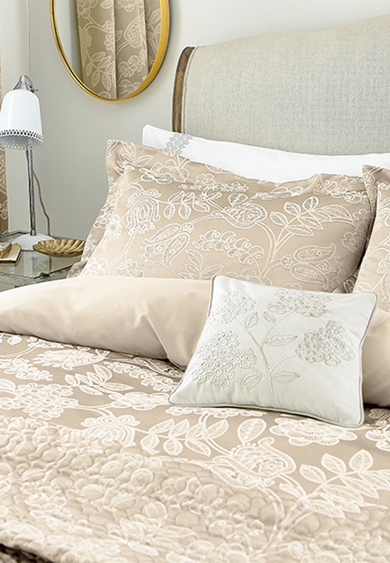 Letty captures the elegance and sophistication of the 20's with its stylised, intricate floral and branch motif woven in a palette of soft, Gold Tones. The cotton/ polyester blend creates a subtle texture but also offers a soft to the touch handle. White embroidered pillowcases add the perfect contrast and the range includes a quilted throw, one size of curtains (66x72