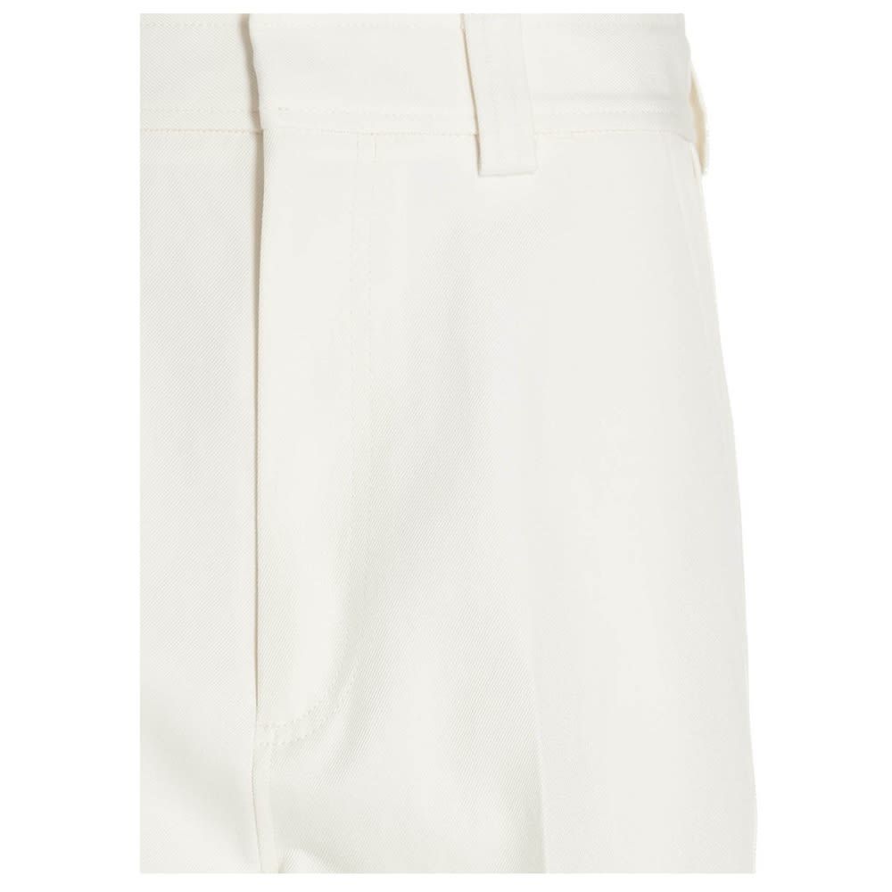 Cotton utility pants with maxi pockets and straight leg.