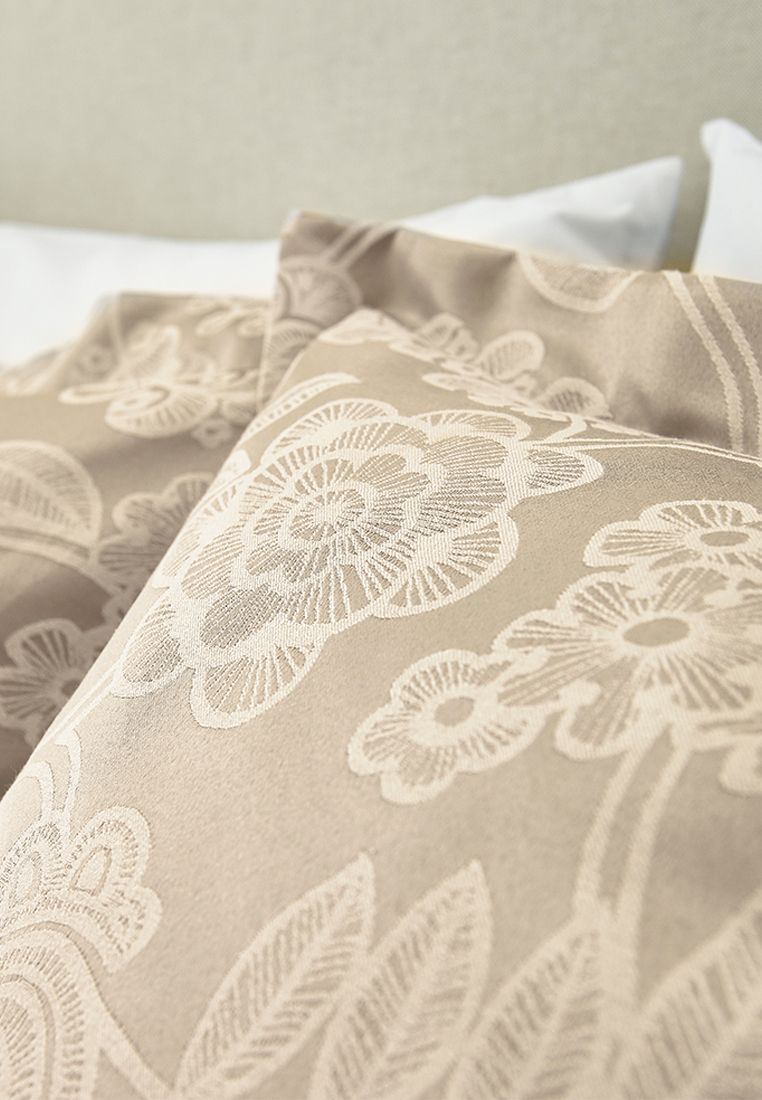 Letty captures the elegance and sophistication of the 20's with its stylised, intricate floral and branch motif woven in a palette of soft, Gold Tones. The cotton/ polyester blend creates a subtle texture but also offers a soft to the touch handle. White embroidered pillowcases add the perfect contrast and the range includes a quilted throw, one size of curtains (66x72