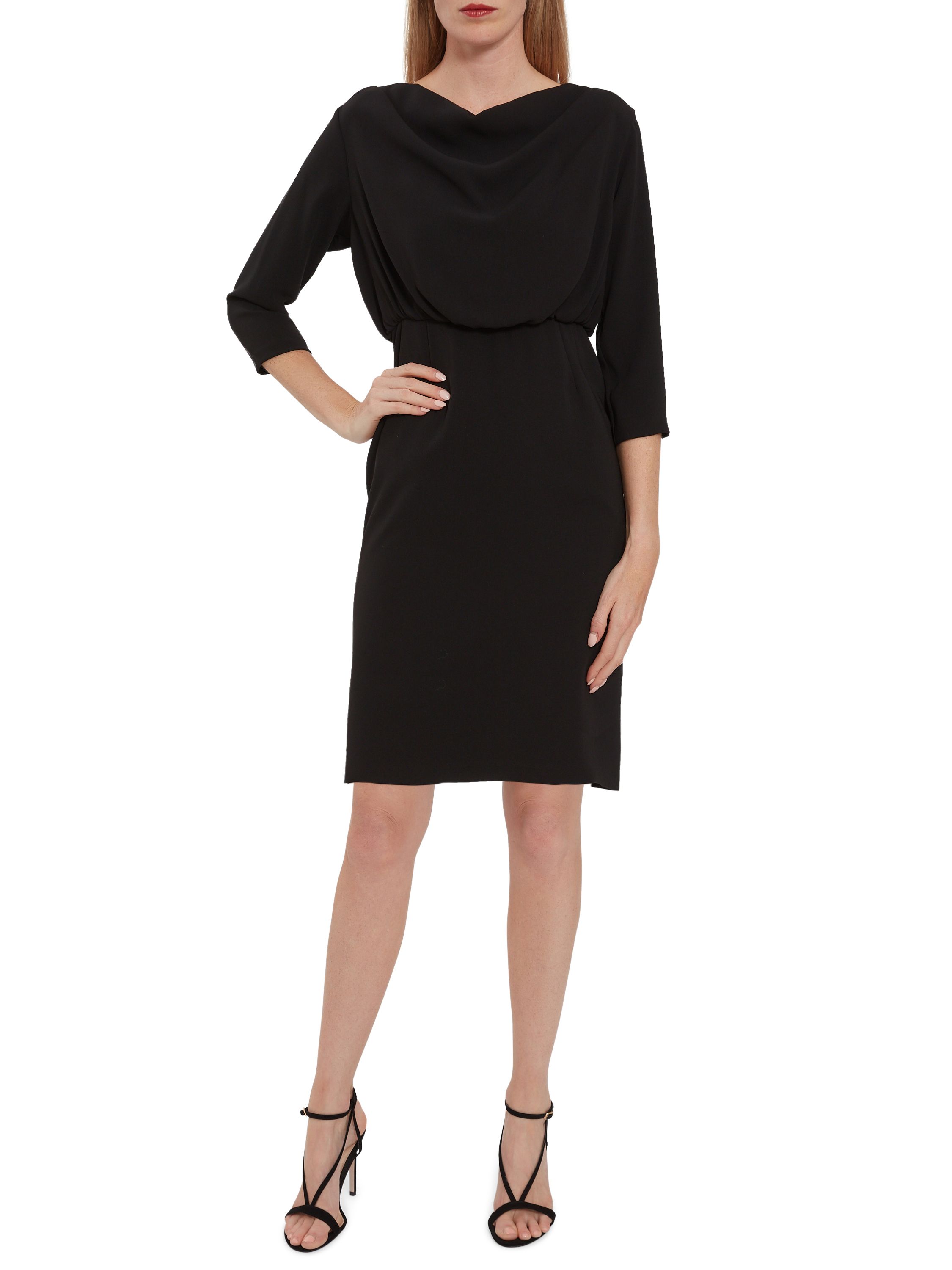 Feel fabulous in this soft crepe dress by Gina Bacconi. It has 1/2 length sleeves and delicate ruching at the waistline with cowl neck detailing for an elegant finish. The dress is fully lined.