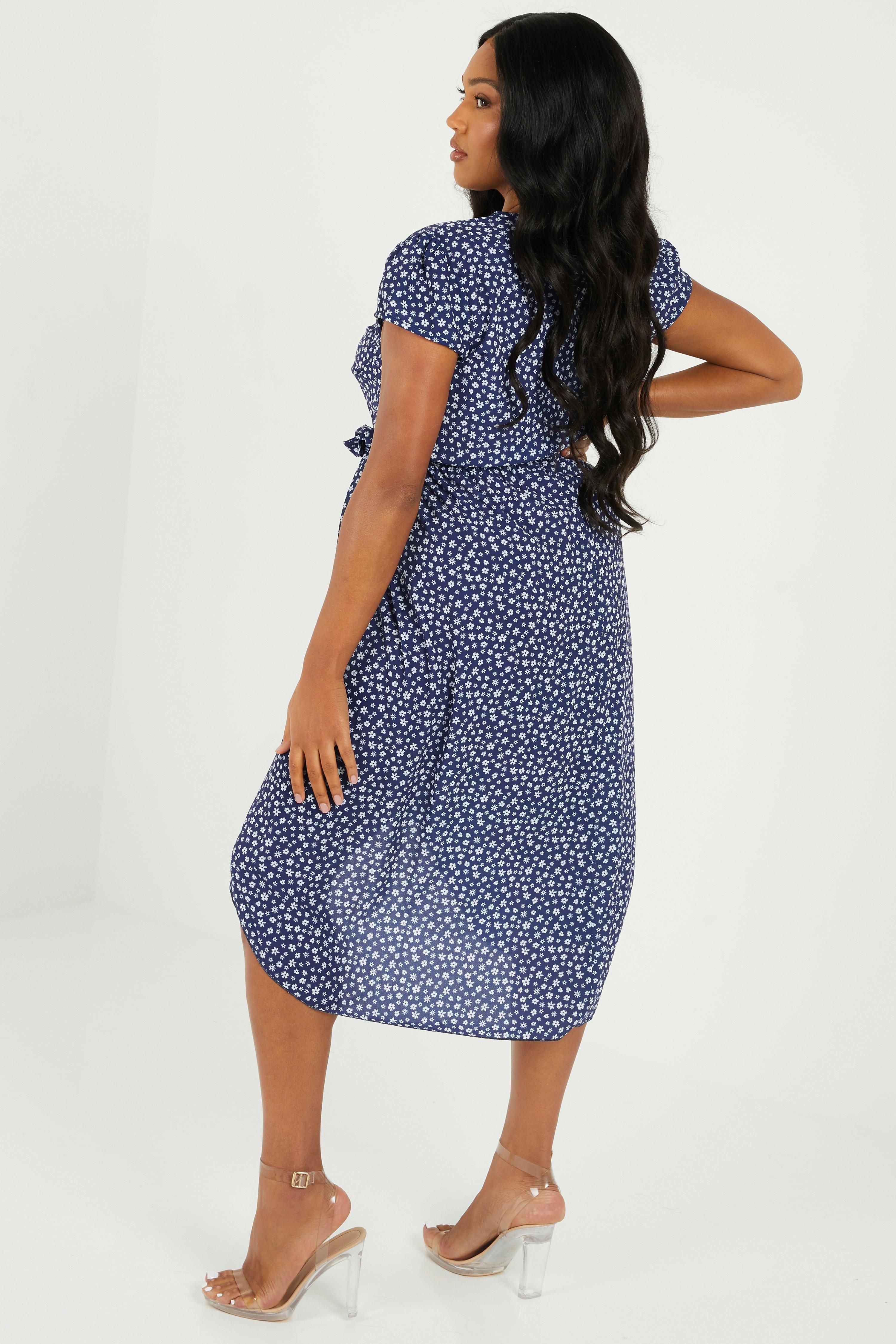 - Curve collection  - Ditsy floral print  - V neckline  - Wrap style  - Midi length   - Length: 125cm approx