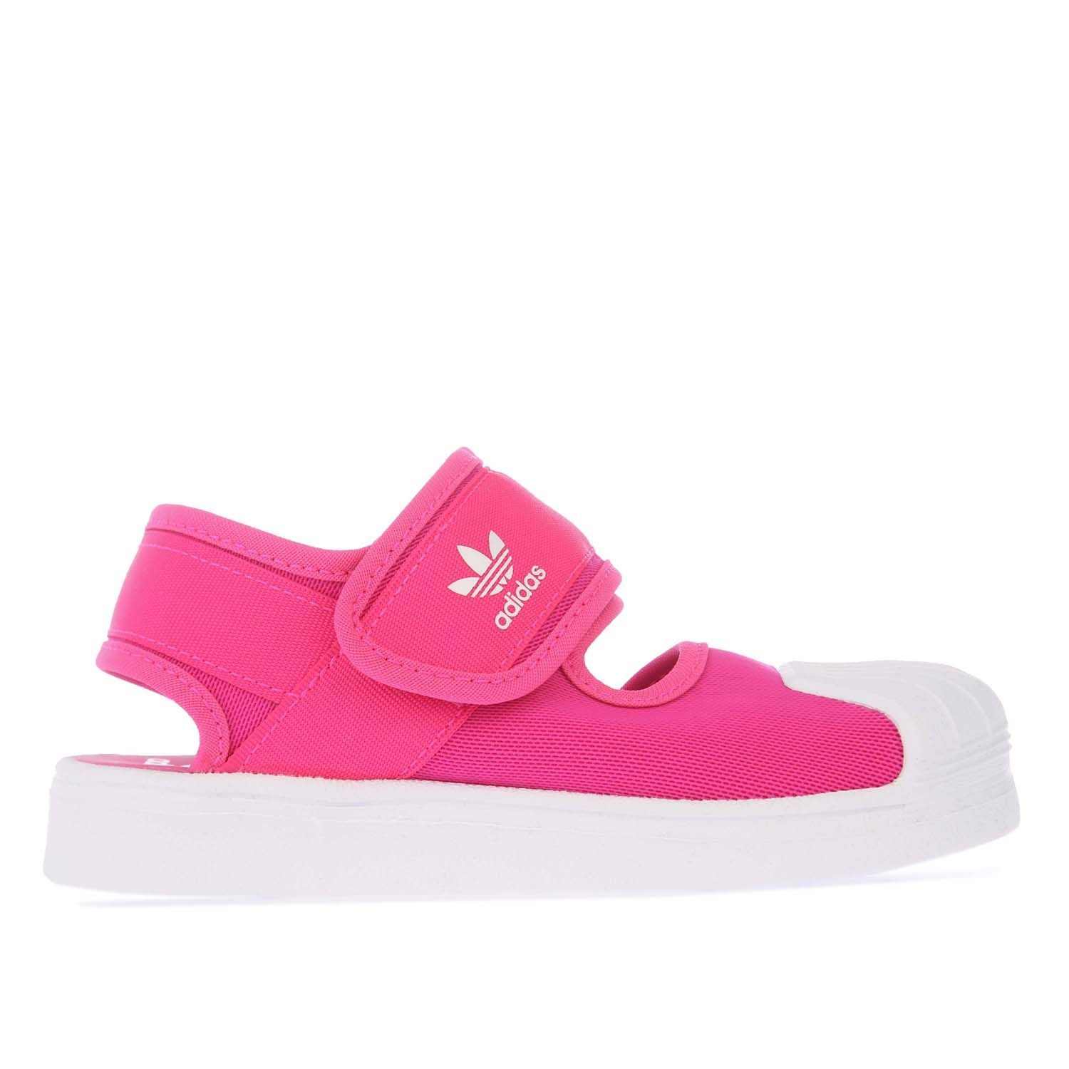 Childrens adidas Originals Superstar 360 Sandals in pink white.- Open mesh upper.- Hook-and-loop strap closure.- Adjustable strap.- Lightly cushioned footbed.- EVA outsole.- Rubber sole and shell toe.- Textile and Synthetic upper  Textile lining  Synthetic sole.- Ref.: FV7585C