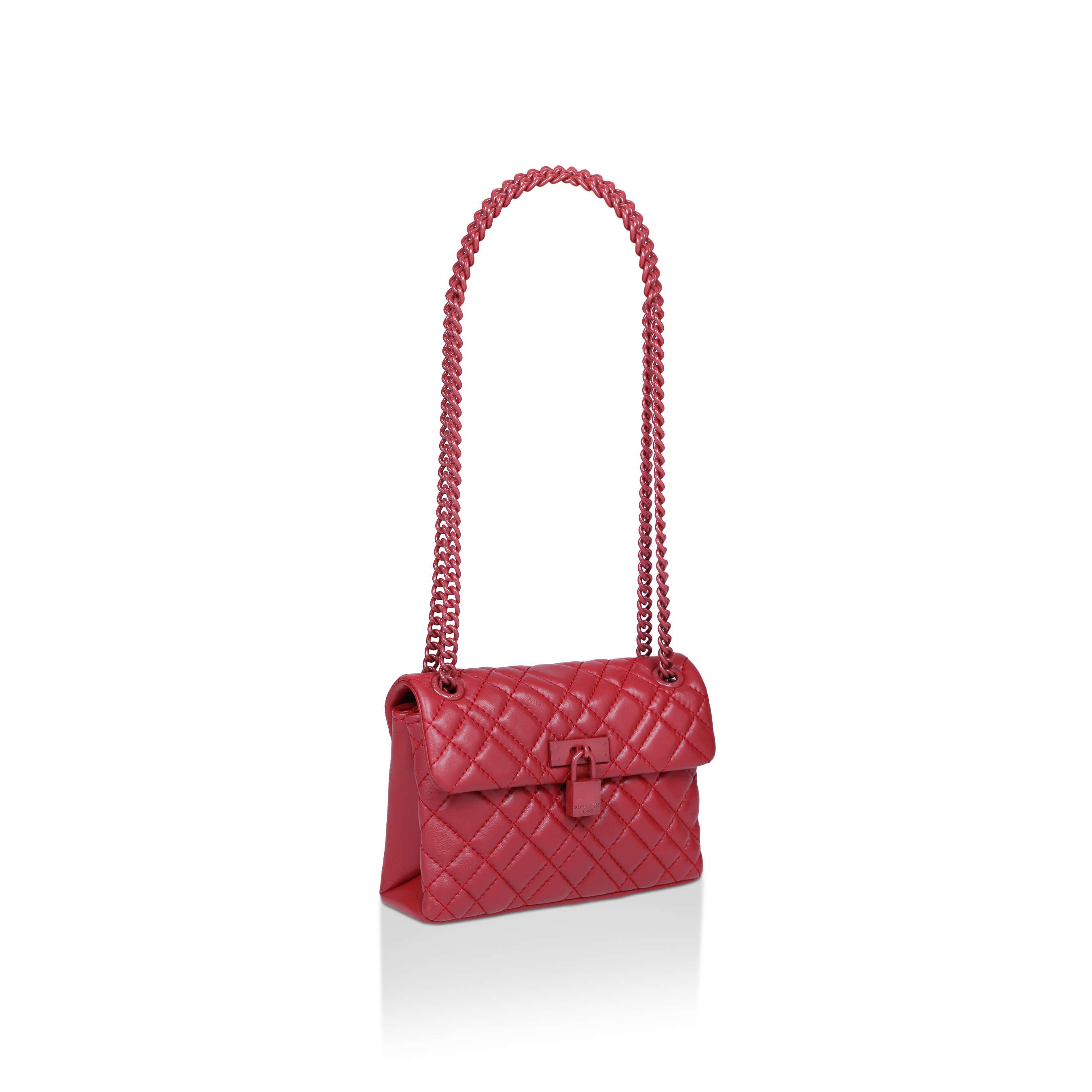 The KGL Mini Brixton Lock Bag is crafted in leather with overstitch quilting design. The wine red lock features branding on the front flap.