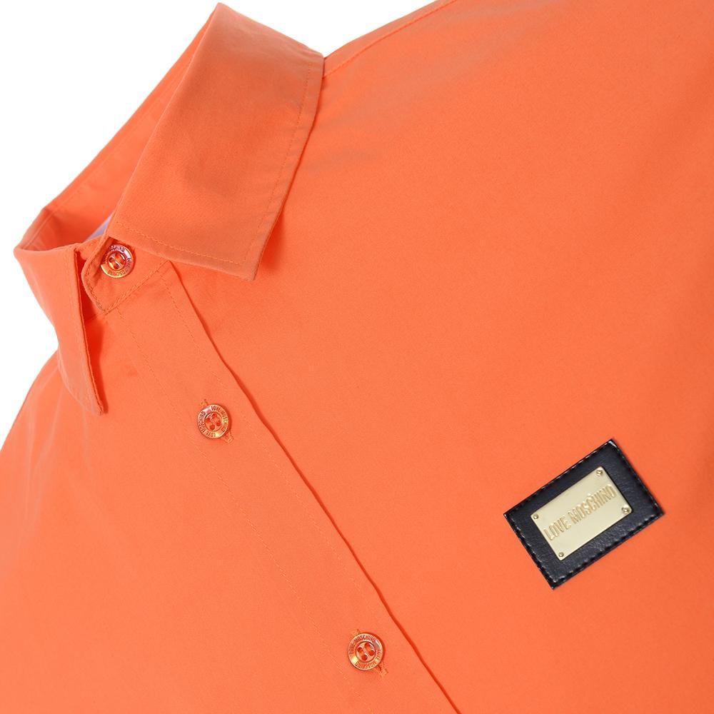 - 97% Cotton, 3% Spandex- Short Sleeved Shirt, Colour: Orange- About The Brand: The Moschino, Boutique Moschino and Love Moschino collections make their mark by expressing its creativity that makes irony and elegance its strength through the reinterpretation of the classics.