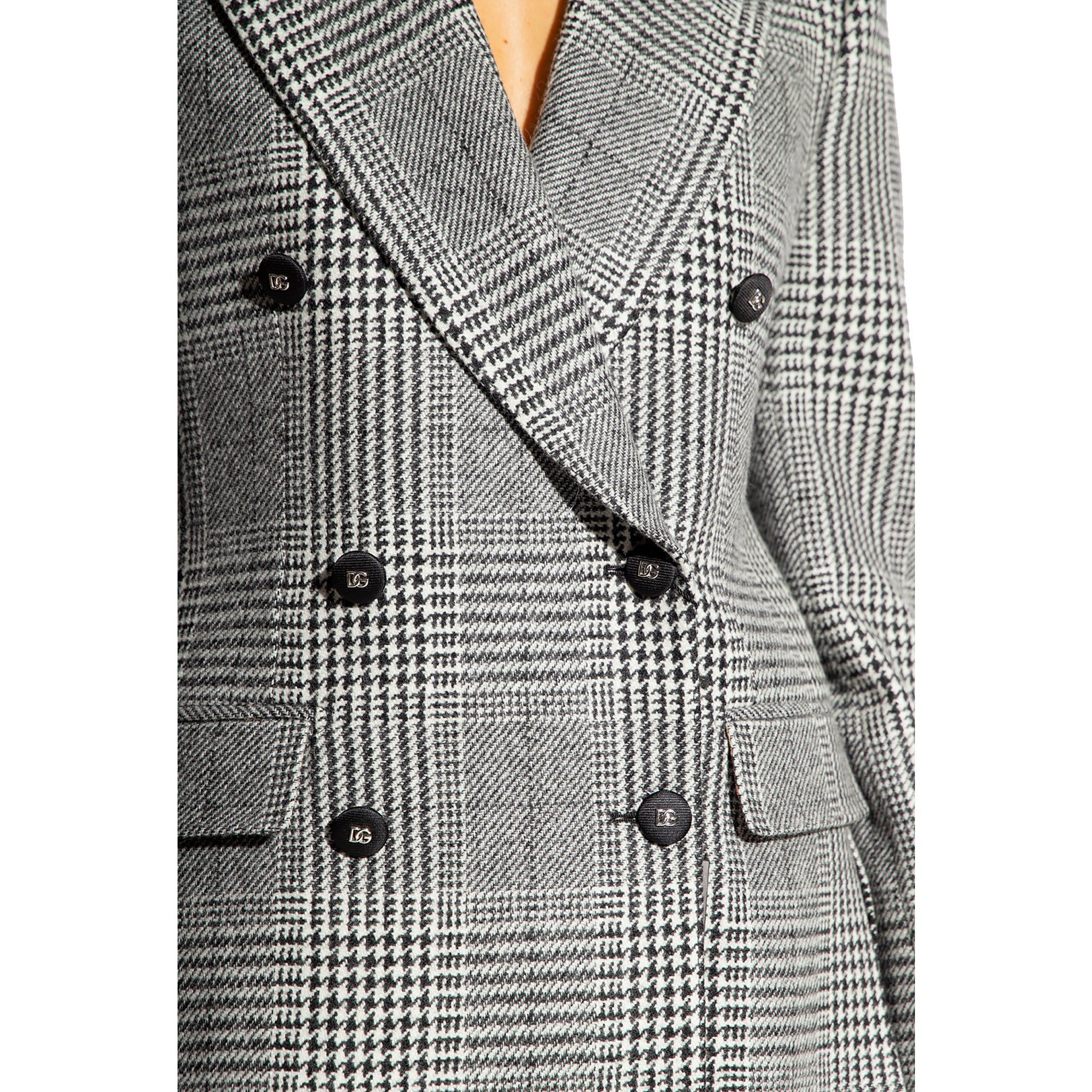 - Composition: 100% virgin wool - Fully lined - Two side pockets - Two side vents - Small silver tone logo detail - Specialist wash - Model is 1.78m wearing size 40 - Made in Italy - MPN F29QVT FQ2M5_S8100 - Gender: WOMEN - Code: JKT DG 2 JD 03 O51 S3 T