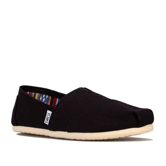 Womens Toms Classics Canvas Pumps in black.<BR><BR>- Classic canvas slip on shoe.<BR>- Elasticated V insert to the front for additional comfort.<BR>- Contrast patterned lining.<BR>- Branding to the side and heel.<BR>- Cushioning suede insole.<BR>- Toe-stich.<BR>- Textile upper. Textile and leather lining. Textile and rubber outsole.<BR>- Ref: 10000869