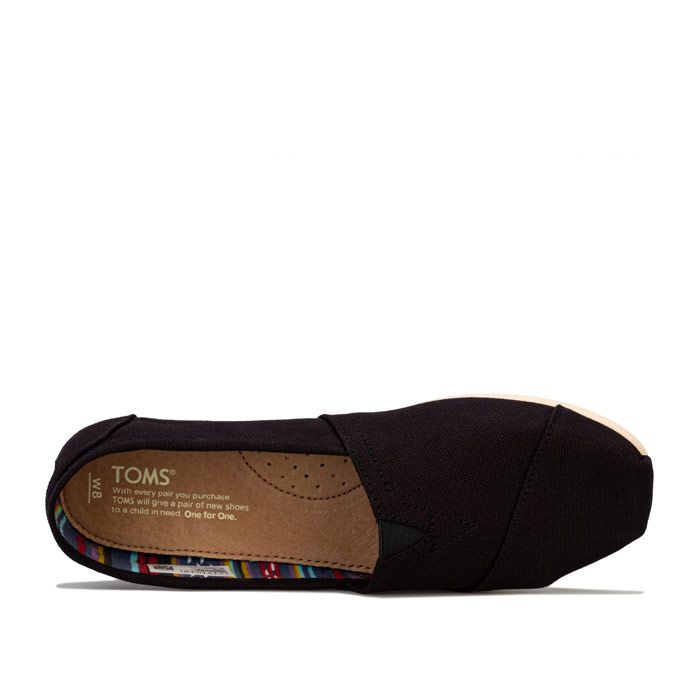 Womens Toms Classics Canvas Pumps in black.<BR><BR>- Classic canvas slip on shoe.<BR>- Elasticated V insert to the front for additional comfort.<BR>- Contrast patterned lining.<BR>- Branding to the side and heel.<BR>- Cushioning suede insole.<BR>- Toe-stich.<BR>- Textile upper. Textile and leather lining. Textile and rubber outsole.<BR>- Ref: 10000869