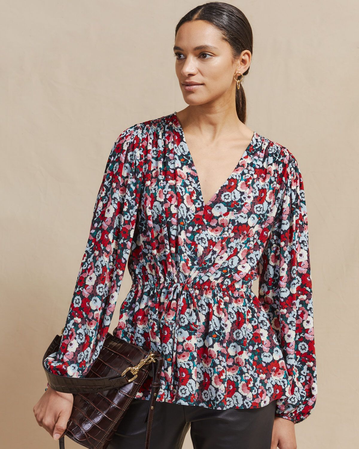 Tapestry Floral printed top with gathered waist and sleeves. The adjustable drawsting belt allows for a versitle look and flattering fit.