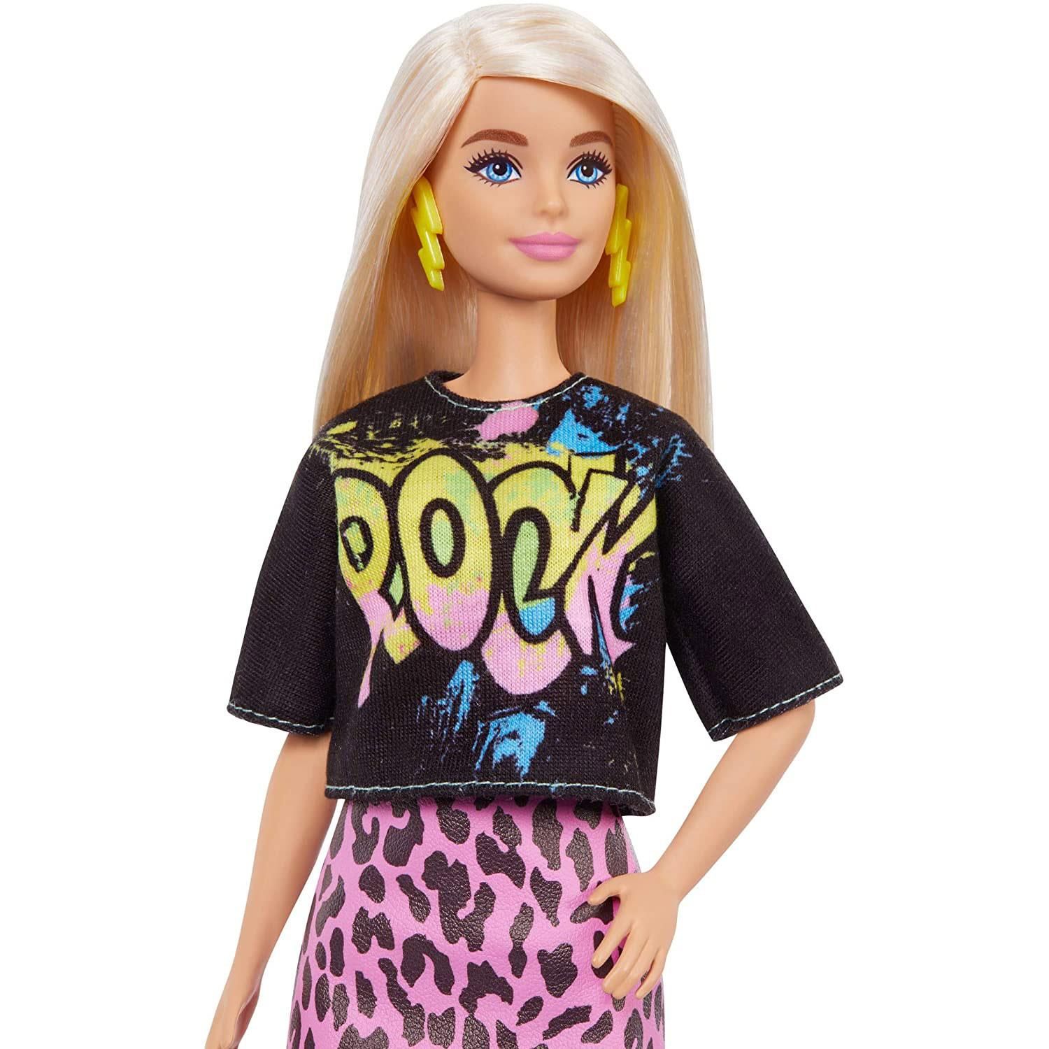 Barbie Fashionista Doll with Rock Tee, Great Toy For 3 Years Old & Up

Barbie and Ken Fashionistas celebrate diversity with fashion dolls that encourage real-world storytelling and open-ended dreams! With a wide variety of skin tones, eye colours, hair colours and textures, body types and fashions, the dolls are designed to reflect the world kids see today - and their attention-grabbing outfits help them stand out with personalities that pop! Use the reusable vinyl package to fill, carry and customize - store Barbie fashions and accessories, carry a doll anywhere, even decorate it and use it for self-expression! Kids can collect Barbie dolls and accessories for infinite ways to play out stories, express their own style and discover that fashion is fun for everyone! Includes Barbie Fashionistas doll wearing fashions and accessories. 

Features:

The latest line of Barbie Fashionistas dolls includes different body types and a mix of skin tones, eye colours, hair colours, hairstyles and so many fashions inspired by the latest trends.
The Barbie doll is the Original body type and wears a black t-shirt with a colourful 