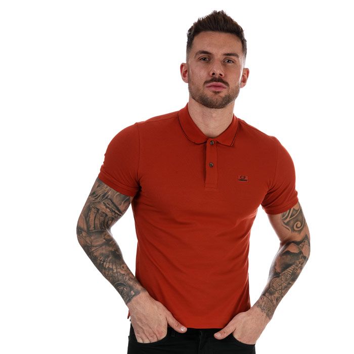 Mens C.P. Company Tipped Stretch Pique Polo Shirt in orange.<BR><BR>-- Classic collar.<BR>- Two button placket.<BR>- Branded buttons.<BR>- Short sleeves with rib-knit cuffs.<BR>- CP Company logo patch embroidered at the chest.<BR>- Garment dyed.<BR>- Slim fit.<BR>- 95 Cotton  5% Elastane. Machine wash at 30 degrees.<BR>- Ref: 10CMPL040W468