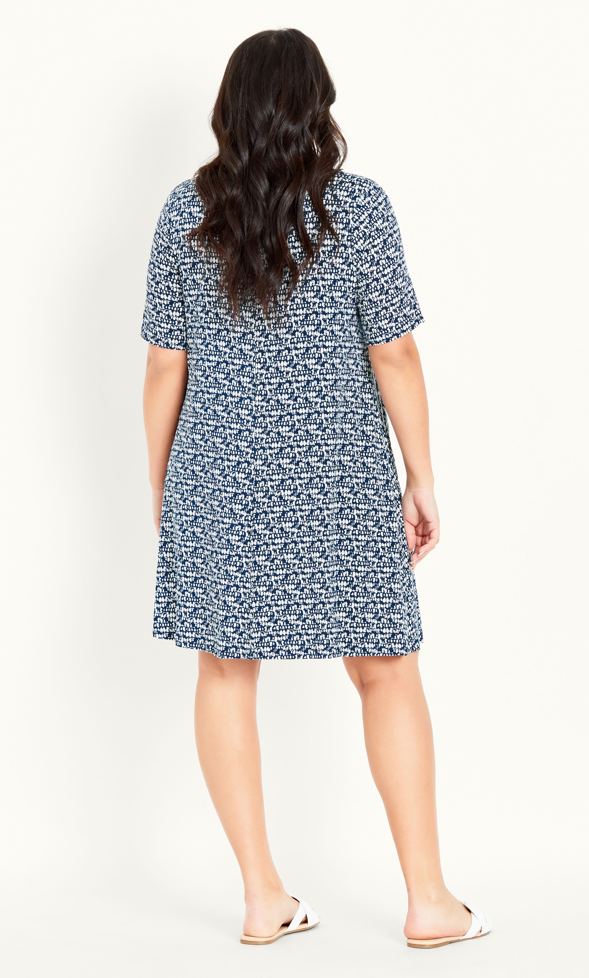 Swish and sway all day long in the super breezy stylings of our Swing Dash Print Dress! Featuring a comfortable relaxed fit and soft stretch fabrication, this dress is bound to get some major airtime in your summer rotation. Key Features Include: - Round neckline - Short sleeves - Relaxed fit - Unlined - Pull over style - Soft stretch fabrication - Above knee length For a chic touch, team with a waist belt, wedges and super cute baguette bag.