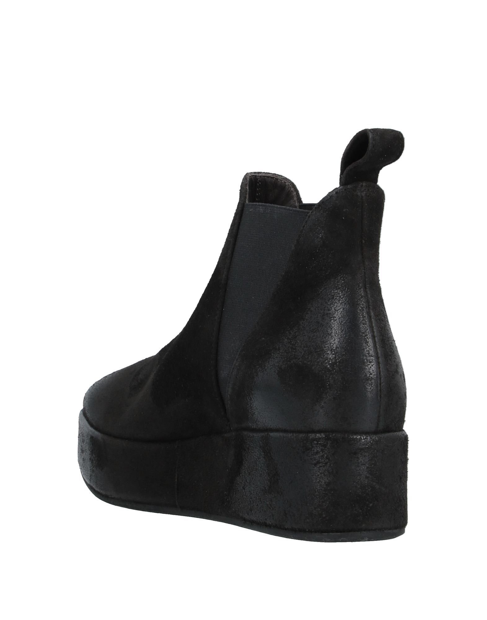 coated effect, no appliqués, solid colour, elasticised gores, narrow toeline, flatform, covered wedge, leather lining, rubber sole, contains non-textile parts of animal origin, large sized