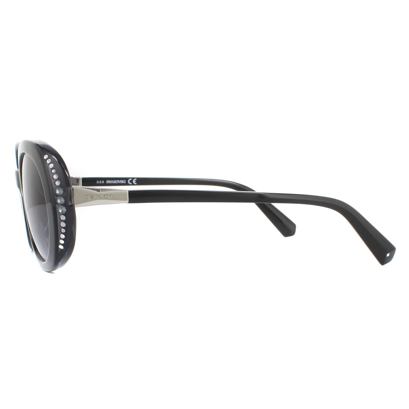 Swarovski Sunglasses SK0281/S 05B Black Grey Gradient are an elegant oval design crafted from lightweight acetate and embellished with Swarovski crystals on the outer edges of the frame with Swarovski logos engraved into the hinges.