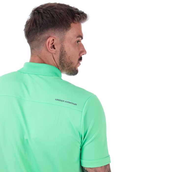 Mens Under Armour Performance Polo Shirt in Green. <BR><BR>- Loose: Fuller cut for complete comfort.<BR>- Smooth anti-pill fabric.<BR>- Lightweight  4-way stretch construction improves mobility and maintains shape.<BR>- Signature Moisture Transport System wicks away sweat to keep you dry and light.<BR>- Anti-microbial technology keeps your gear fresher for longer.<BR>- Durable rib-knit collar.<BR>- 3 button placket.<BR>- Side split hem.<BR>- Shoulder to hem approx. 28in<BR>- 95% Polyester  5% Elastane. Machine Washable.<BR>- Ref: 1242755375<BR><BR>Measurements are intended for guidance only.