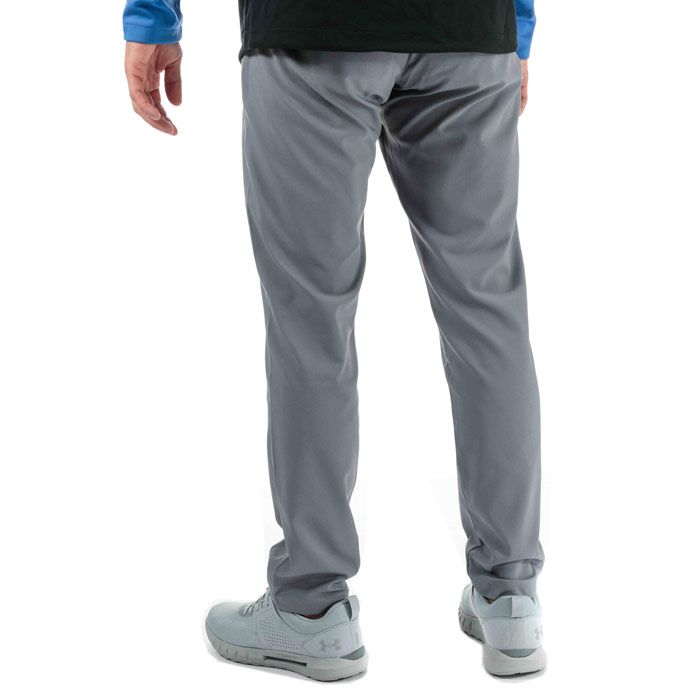Mens Under Armour Showdown Tapered Pants  Grey. <BR><BR>- Material wicks sweat & keeps dry.<BR>- Light  stretchy woven fabric delivers total comfort.<BR>- Stretch-engineered waistband for superior mobility & insane comfort.<BR>- Flat-front  4-pocket design.<BR>- Tapered leg fit.<BR>- Rear pockets stitched closed to maintain shape in transit—rip or cut to remove.<BR>- For Golf And Other Sports.<BR>- 58% Nylon  36% Polyester  6% Elastin Machine washable.<BR>- Ref:. 1309546513