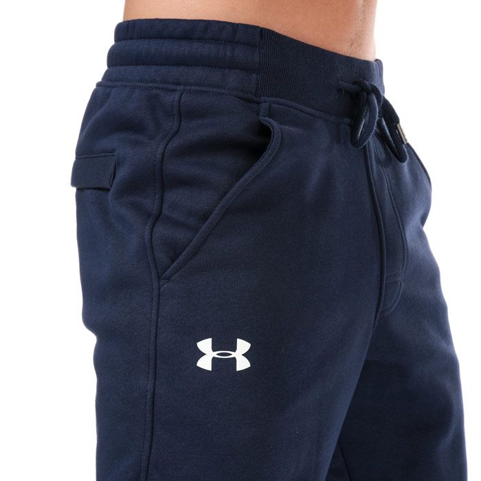 Mens Under Armour UA Rival Fleece Fitted Jog Pants in navy.<BR><BR>- ColdGear fabric traps heat and wicks sweat to keep you warm  dry and light.<BR>- Super soft  cotton-blend fleece with brushed interior for extra warmth.<BR>- Elasticated waist with drawcord.<BR>- Mock fly detail.<BR>- Front slant pockets.<BR>- Rear pocket with snap closure.<BR>- Under Armour branding at right thigh.<BR>- Tapered leg.<BR>- Ribbed cuffs.<BR>- Fitted fit; next to skin without the squeeze.<BR>- 80% Cotton  20% Polyester.  Machine washable.<BR>- Ref: 1309818-410