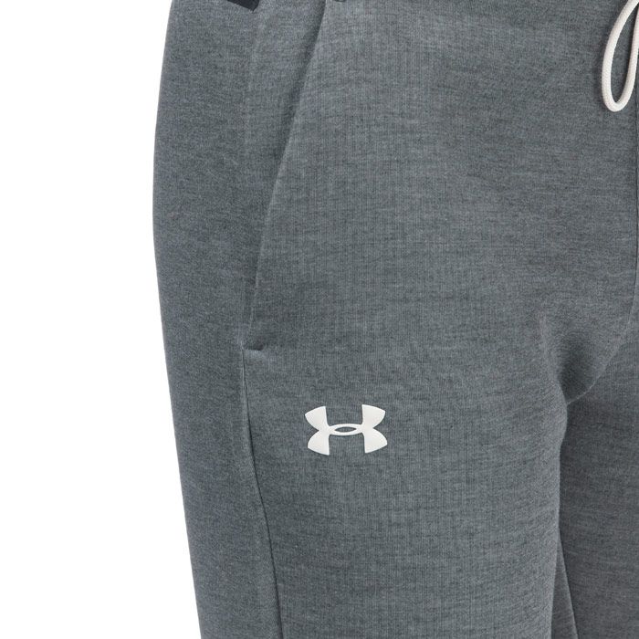 Mens Under Armour Unstoppable Move Light Joggers in Grey<BR><BR>- Exposed  wordmark elastic waistband.<BR>- External drawcords.<BR>- Lightweight  soft breathable fabric.<BR>- 4-way stretch material.<BR>- Pockets to sides.<BR>- Faux fly.<BR>- Tapered leg fit with contrast elastic cuff.<BR>- Quick drying  sweat wicking material.<BR>- Loose: Fuller cut for complete comfort.<BR>- UA branding to right thigh.<BR>- Inside leg 30in approximately.<BR>- 100% Polyester. Machine Washable.<BR>- Ref: 1329268002<BR><BR>Measurements are intended for guidance only.