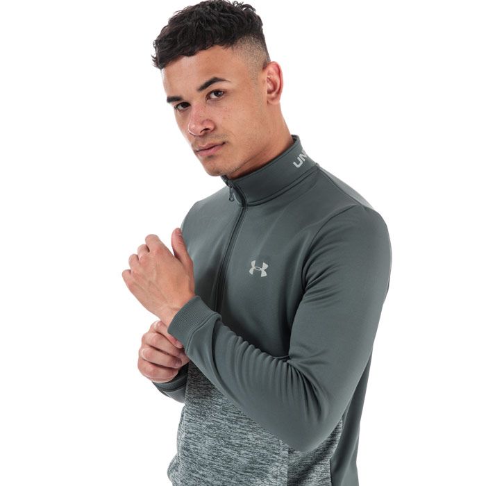 Mens Under Armour Fleece ½ Zip Sweatshirt in grey.<BR><BR>-  Zip down front.<BR>- Kangaroo Pocket.<BR>- Under Armour branding printed to chest.<BR>- Ribbed cuffs.<BR>- 100% Polyester. Machine washable. <BR>- Ref: 1357205012