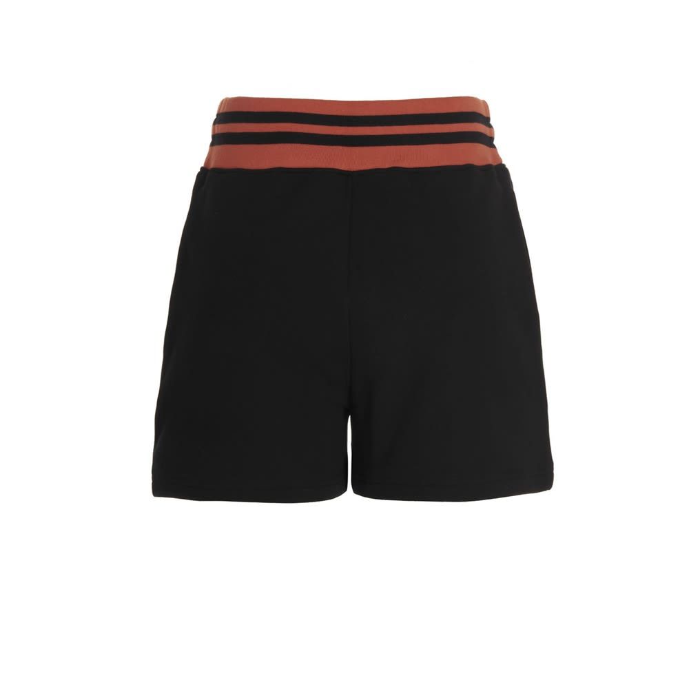Cotton logo shorts with an elastic waistband and a drawstring.